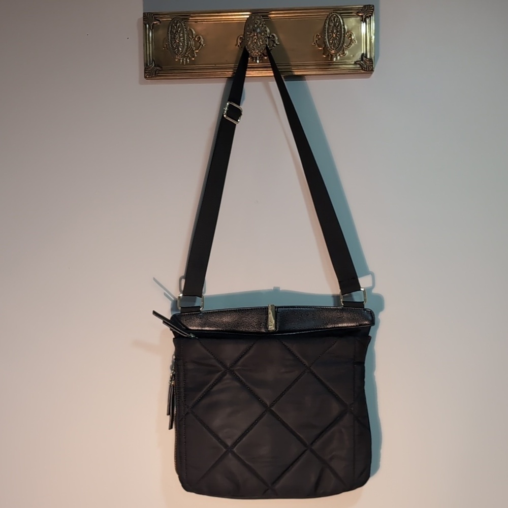 Tutilo New York Black Quilted Puffer Crossbody Bag.
